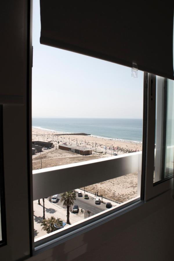 A Nossa Casa Da Costa Apartment กอสตา ดา กาปาริกา ภายนอก รูปภาพ